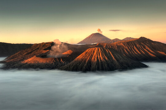 A sea of clouds covers the caldera at sunrise in Bromo-Tengger-Semeru National Park on the island of Java in Indonesia      