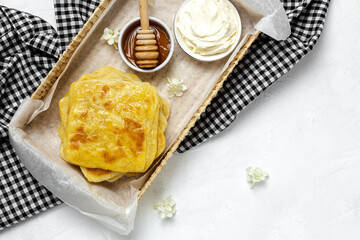 Homemade rghaif or msemen Arab with honey and cream cheese