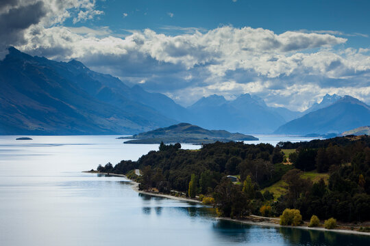 Storm clouds depart after a rainstorm on Lake Wakatipu near Glenorchy and the Southern Alps on New Zealand's South Island    