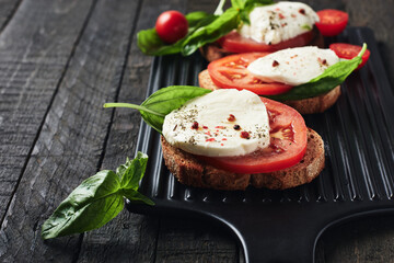 Open caprese sandwiches.