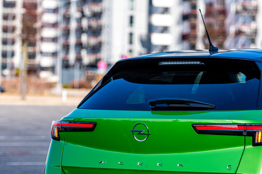 close-up of the green electric vehicle Opel Mokka-e, future technologies, modern design