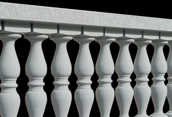  beautiful white stone fence on a black