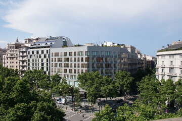 Fototapeta na wymiar Top view on Gracia avenue with luxurious buildings in Barcelona city