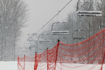 Ski Lift in Snowy and Foggy Weather