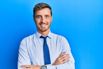 Handsome caucasian man wearing business shirt and tie happy face smiling with crossed arms looking at the camera. positive person. - Powered by Adobe
