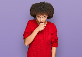 Young hispanic girl wearing casual clothes feeling unwell and coughing as symptom for cold or...