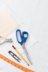 Seamstress tools on the cutting table