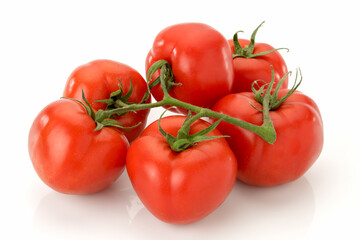 tomatoes isolated on white background. Bunch of natural tomatoes