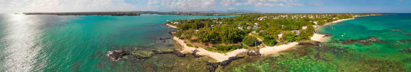 Fototapeta na wymiar Beautiful beach in Grand Baie, Mauritius from drone point of view