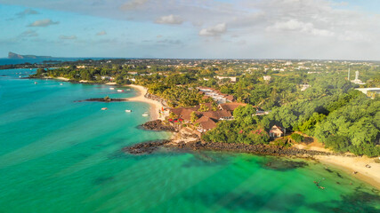 Aerial view of Grand Baie coastline from drone, Mauritius