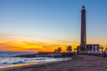 Sunset view of Maspalomas lighthouse at Gran Canaria, Canary Islands, Spain - obrazy, fototapety, plakaty
