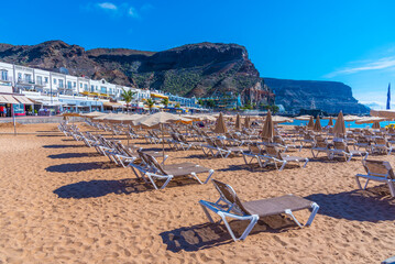 sunny day on a beach at Puerto de Mogan at Gran Canaria, Canary islands, Spain