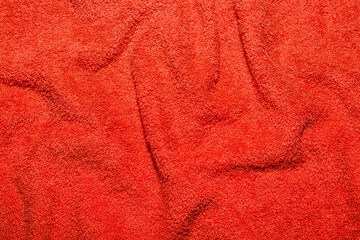 wrinkled red color terry cloth and towel texture