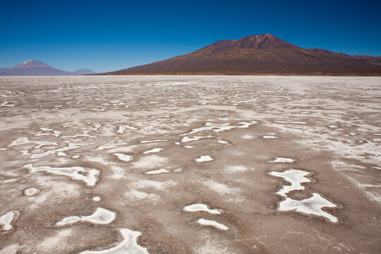 The Salar de Chiguana is a high-altitude muddy salt pan that straddles the border of Bolivia and Chile.