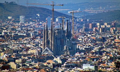 Sagrada Familia with city skyline in Barcelona, Spain.