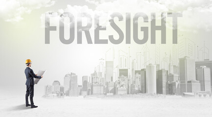 Fototapeta premium Young businessman with hard hat