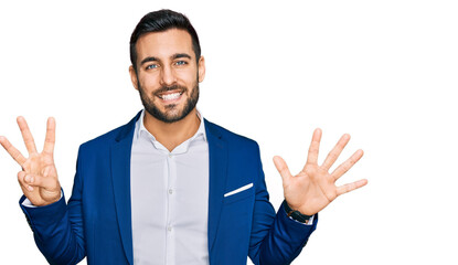 Young hispanic man wearing business jacket showing and pointing up with fingers number eight while smiling confident and happy.