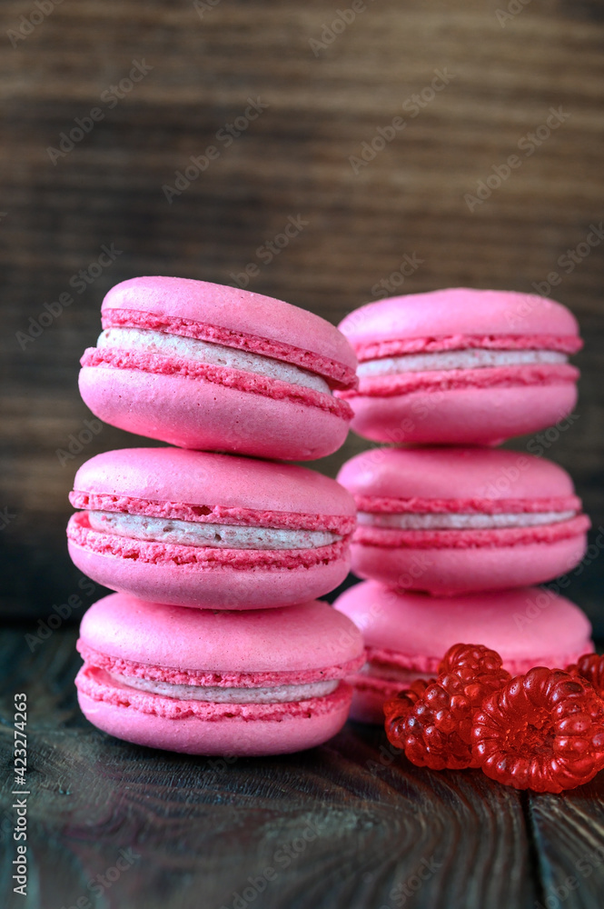 Wall mural macarons on the wooden background