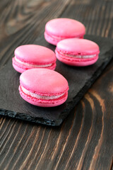 Macarons on the black stone board