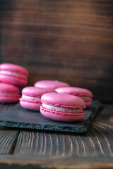 Macarons on the black stone board