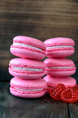 Macarons on the wooden background