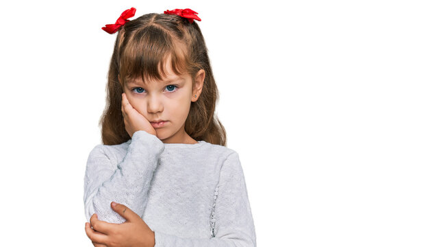 Little caucasian girl kid wearing casual clothes thinking looking tired and bored with depression problems with crossed arms.
