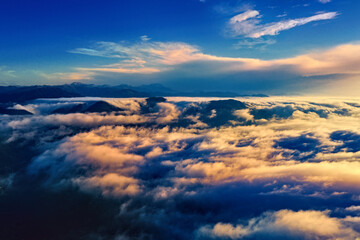 Clouds above the mountains, beautiful panoramic view
