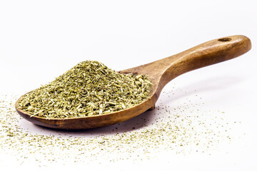 wooden spoon with yerba mate on isolated white background