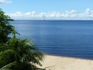 View of the Rio Negro near Manaus, in the background the Rio Negro bridge. Amazon - Brazil