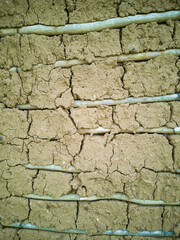 Background with wall texture made of mud
