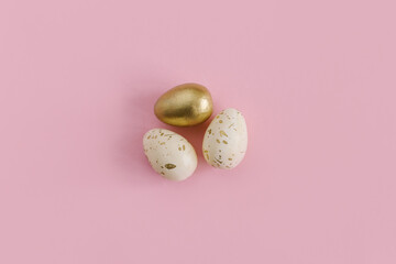 Easter eggs on a pink background. Pastel colors.