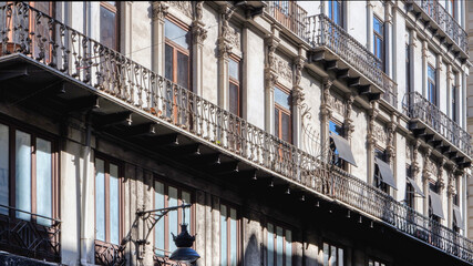 Wrought iron balconies on the Art Nouveau building in the historic center of Valencia, Spain