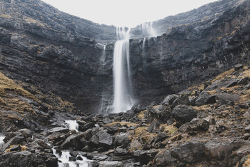 Fototapeta na wymiar great scandinavian waterfall with big rocks