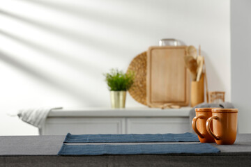 Spring table in the kitchen with the rays of the morning sun and kitchen attributes 