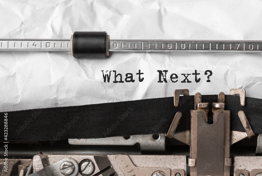 Poster text what next typed on retro typewriter