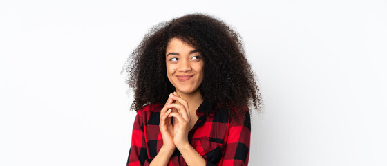 Young african american woman over isolated background scheming something