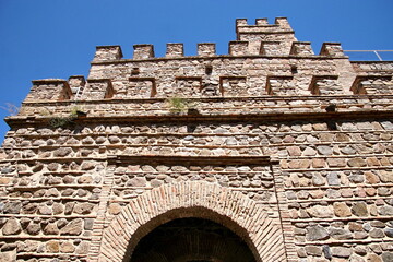 The gate of Alfonso VI in the historic ramparts of Toledo, Spain