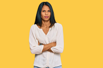 Young african american woman wearing casual clothes skeptic and nervous, disapproving expression on face with crossed arms. negative person.