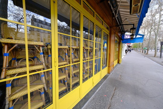 Some chairs piled up at some closed restaurant in Paris the 26th march 2021, due to the covid19 pandemic.