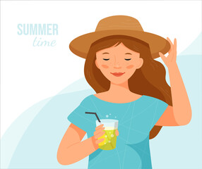 Girl with freckles in a straw hat stands with a glass of lemonade. Summer time. 