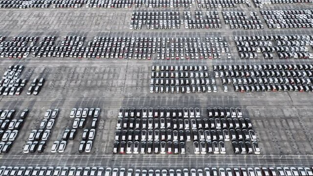 Aerial view of big parking lot with new cars, Port of Singapore