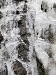 Full frame shot of icicles on a rock wall