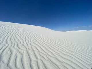 Fototapeta na wymiar Patterns on the sand dunes of the White Sands National Park in New Mexico