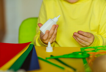 step by step instructions, colored paper application, easter bunny, children's hands