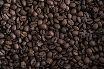 top view of fresh roasted coffee beans background