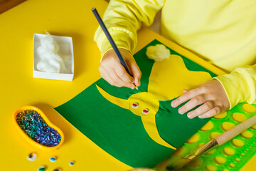step by step instructions, colored paper application, easter bunny, children's hands