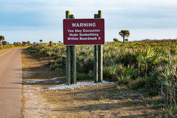 Warning Nude Sunbathers Ahead