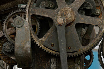 Fototapeta na wymiar A detail of an old rusty machine
