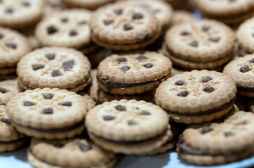 Baked cookies filled with chocolate cream
