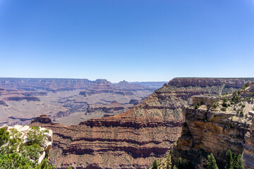 Clear skies and The Grand Canyon. that is a huge valley cut by the Colorado River.